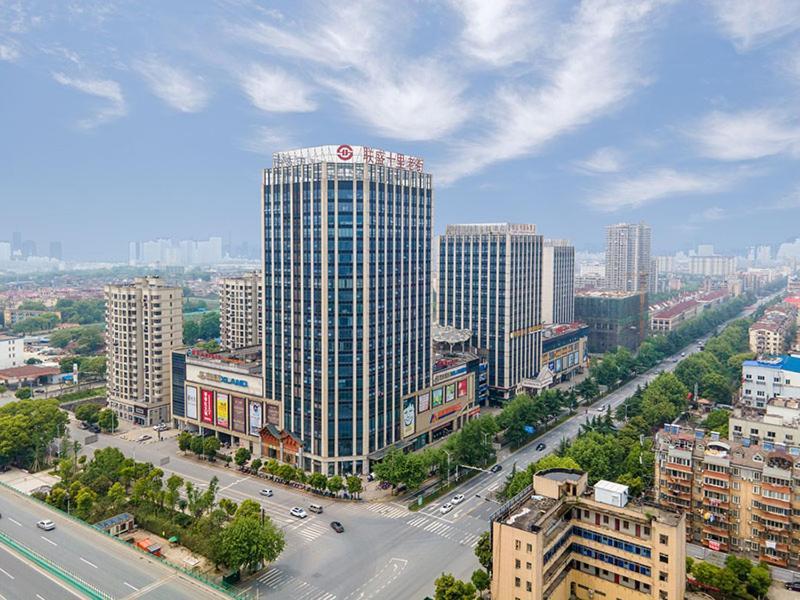 Vienna International Hotel Jiujiang Shili Street エクステリア 写真